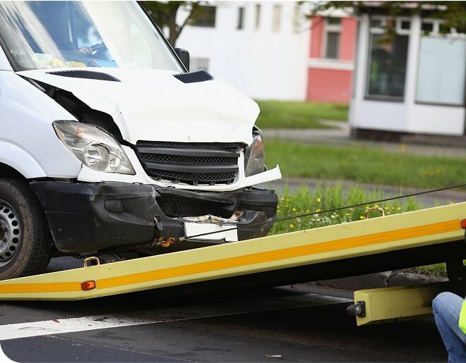 Service van with its front smashed in