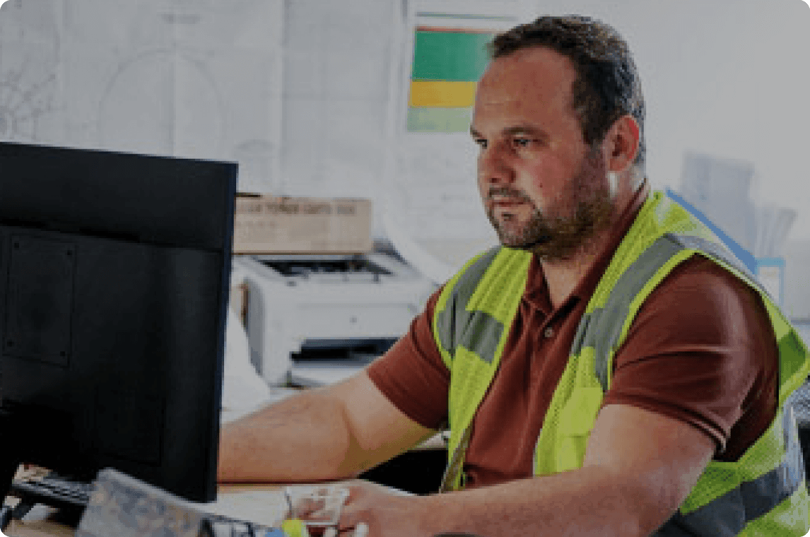 Fleet manager at computer