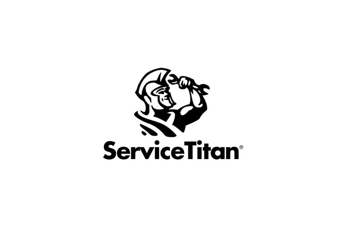 The ServiceTitan logo features a stylized graphic of a Spartan warrior flexing his arm and holding a wrench, with the company name written in bold text below.