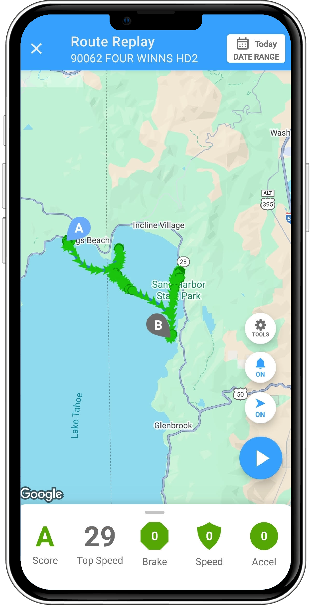 A mobile app interface displays a route replay on a map of Lake Tahoe with start and end points, accompanied by trip statistics at the bottom, including a score of A and a top speed of 29.