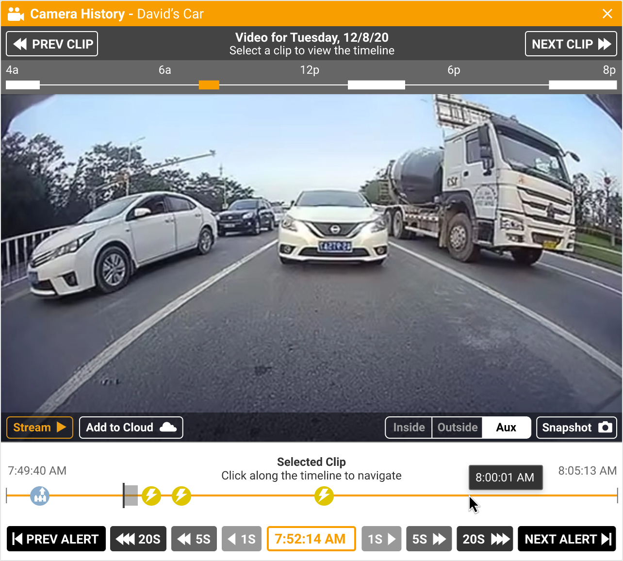 A dashcam view from a vehicle showing traffic on a multi-lane road, including a white car and a cement truck, displayed within a video player interface with timeline controls.
